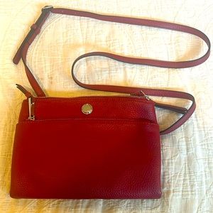 Red pebbled leather crossbody bag
